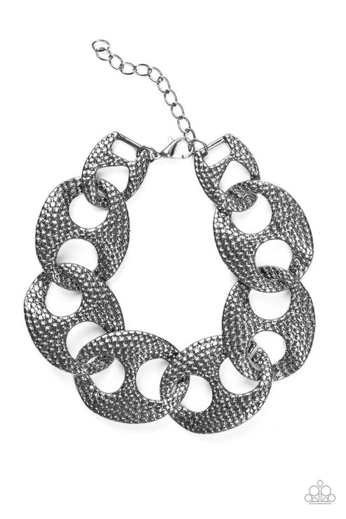 Casual Connoisseur - Oversized Black (Gunmetal) Embossed Shimmery Circular Asymmetrical Textured Industrial Link Bracelet B#4078